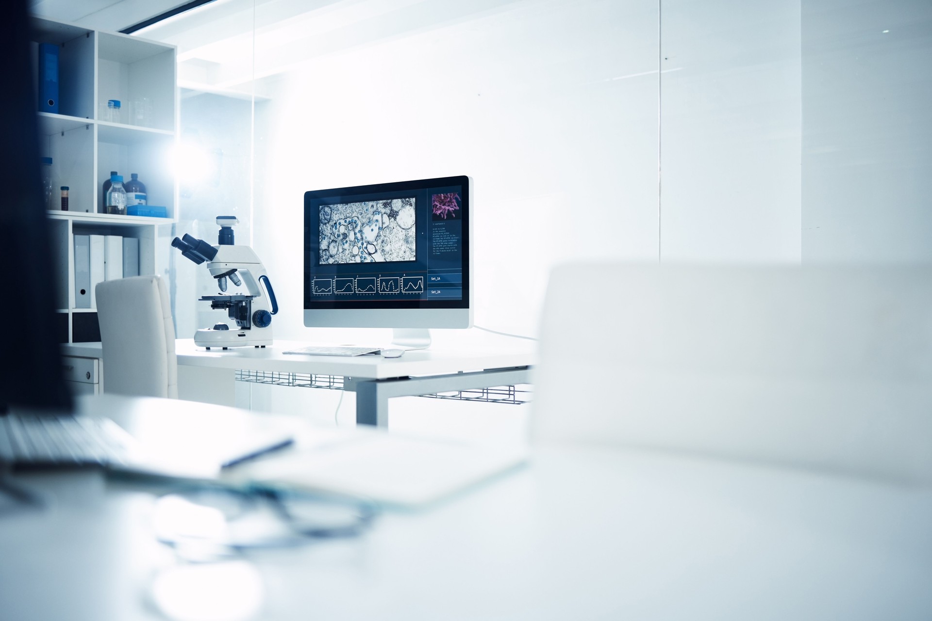 Shot of a microscope and computer in a modern laboratory