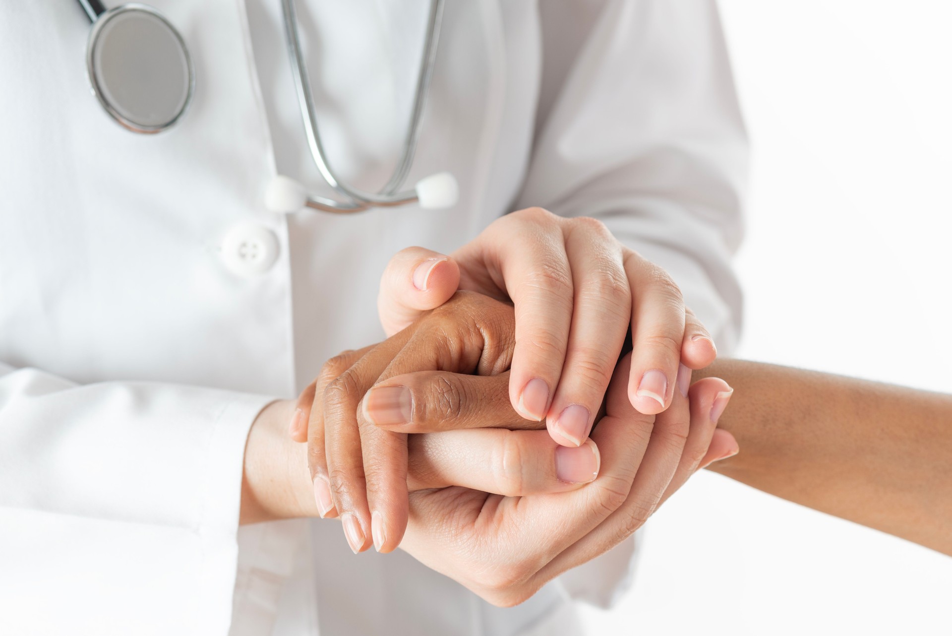 Doctor Holding a Patient’s Hand for Comfort